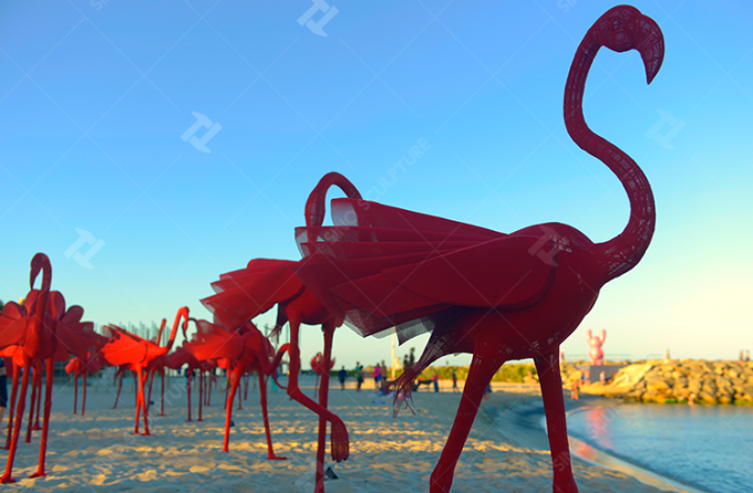 The Installation of the Red Flamingo sculptures