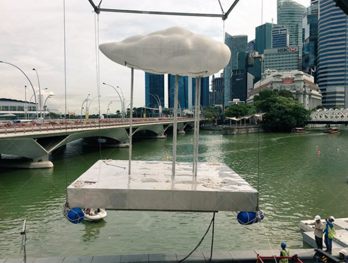 Singapore s First Floating Stainless Steel Sculpture with Rain Effect 1