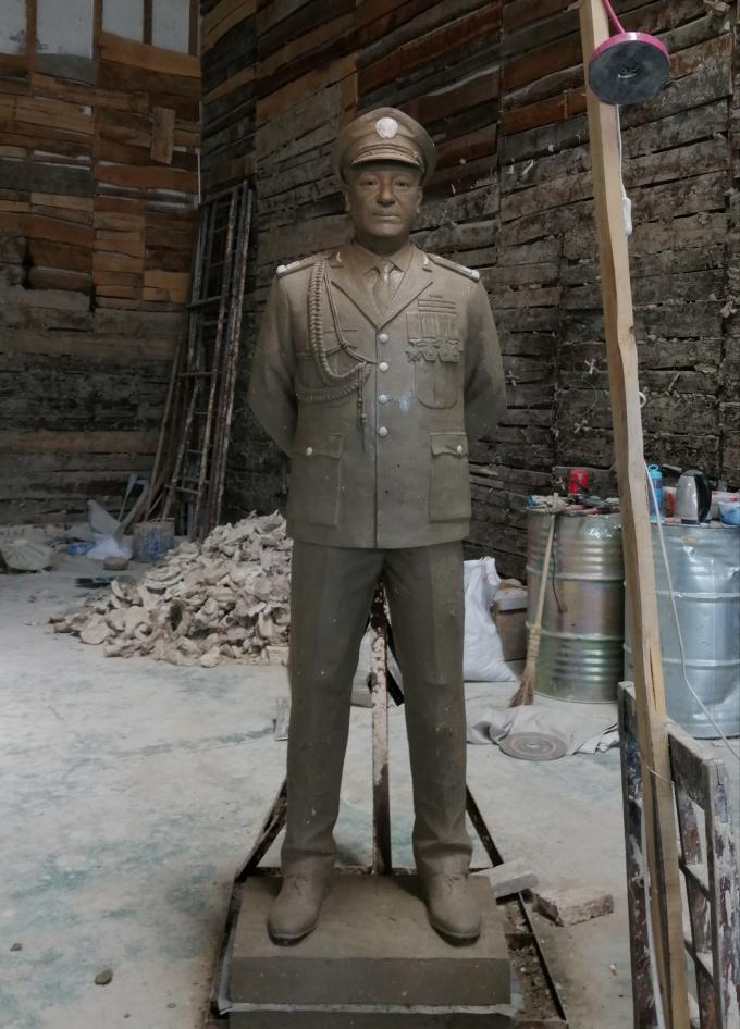 The completion of the cast bronze Figure